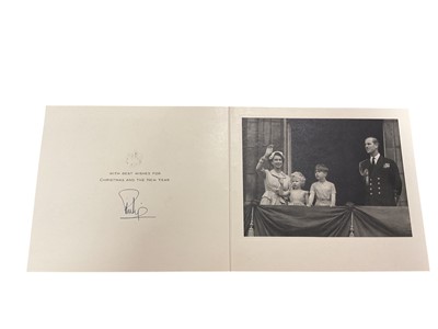 Lot 69 - H.R.H. The Duke of Edinburgh, scarce early 1952 Christmas card with photograph of the young Royal Family on the balcony at Buckingham Palace to the interior, signed in ink 'Philip'