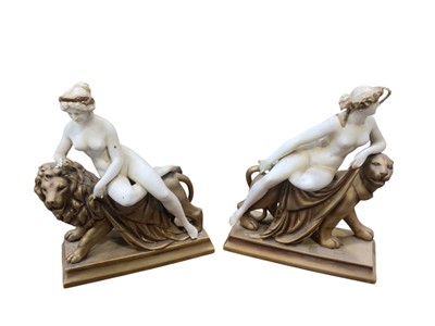Lot 5072 - Pair of late 19th century continental bisque/parian porcelain sculptures of 'Una and the Lion' and 'Ariadne and the Panther'
