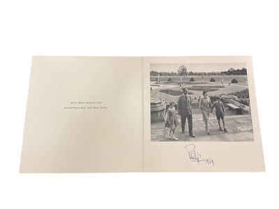 Lot 71 - H.R.H. The Duke of Edinburgh, scarce 1959 Christmas card with photograph of the young Royal Family on a garden terrace to the interior, signed in ink 'Philip 1959'