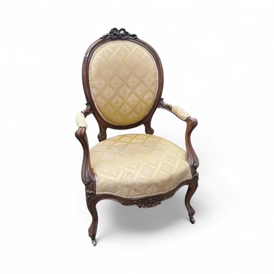 Lot 1276 - Louis XVI style beech framed open armchair, with ribbon carved cresting and pad back and seat on cabriole legs
