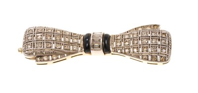Lot 400 - Art Deco diamond and black onyx bow brooch