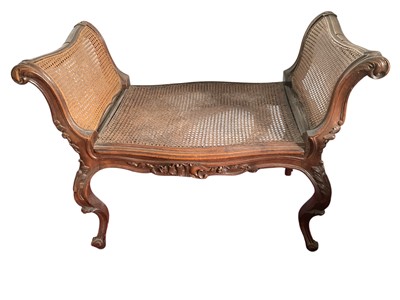 Lot 1300 - Late 19th / early 20th century carved beech and caned window seat of serpentine outline