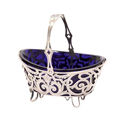 Lot 268 - Late Victorian silver sugar basket with blue glass liner (Birmingham 1898), 2.4ozsLate Victorian silver sugar basket with pierced and engraved decoration and blue glass liner, (Birmingham 1898)