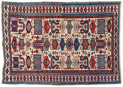 Lot 1366 - Fine Kuba rug, North Caucasus, c.1890, the ivory field with overall stylised cloud bands, hooked and stepped guls, animals and jewellery, within an ivory stepped gul border, 182 x 127cm
