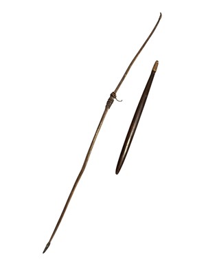 Lot 794 - Tribal club, probably Dinka, Sudan, and a Tribal bow (2)
