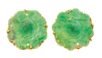 Lot 419 - Pair of Chinese carved green jade/green hardstone earrings, the flower shape carved and pierced panels in yellow metal setting, 22mm.