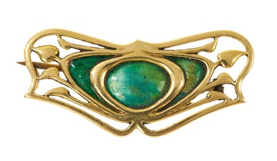 Lot 422 - Edwardian Art Nouveau yellow metal and enamel brooch in the manner of Archibald Knox, the pierced panels with blue and green enamel ground, 40mm.