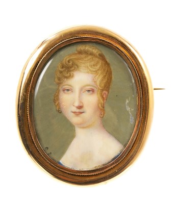 Lot 470 - Regency portrait miniature on ivory depicting a portrait of a young lady, in glazed oval yellow metal frame with mother of pearl back and brooch fitting, 60mm.