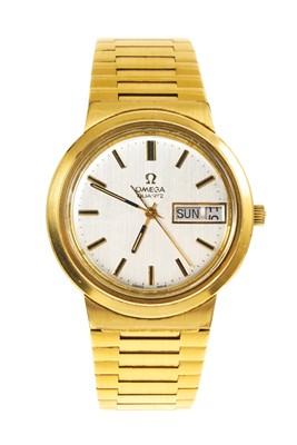 Lot 504 - Vintage Omega Quartz calendar wristwatch with day/date dial in gold plated case on gold plated bracelet, together with an Omega service pouch