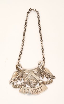 Lot 203 - Sarah Jones (B. 1948), contemporary silver wine / decanter label with engraved naming 'Claret', produced for the Worshipful Company of Vintners and modelled as the Livery Companies coat of arms,...