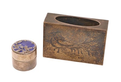 Lot 204 - Sarah Jones (B. 1948), contemporary silver matchbox cover with engraved decoration depicting a peacock, (London 1973), together with a contemporary silver pill box decorated with acorns in relie...