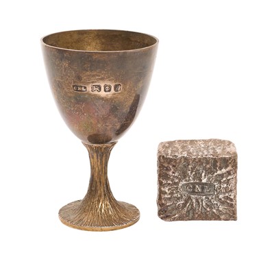 Lot 213 - Christopher Nigel Lawrence (b.1936), contemporary silver egg cup with bark effect stem and foot, (London 1975), together with a contemporary white metal ingot stamed 'CNL', maker Christopher La...