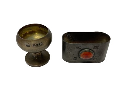 Lot 211 - Robert Welch (1929 - 2000), contemporary silver napkin ring of oval form, set with a cabochon stone, (London 1972), together with a contemporary silver cup, (London 1977), maker Robert Welch, th...