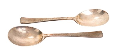 Lot 218 - *Gerald Benney CBE RDI (1930 - 2008), pair of contemporary silver serving spoons, the stems with bark effect decoration, (London 1991), maker Gerald Benney, each 21.7cm in overall length, 8ozs,...