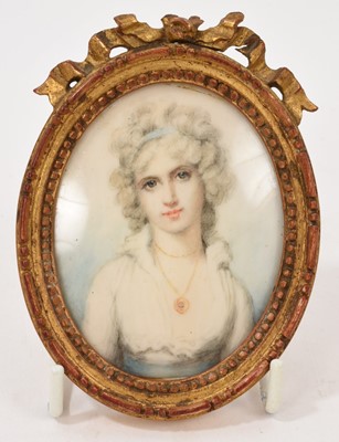 Lot 818 - Antique portrait miniature of a woman, on ivory