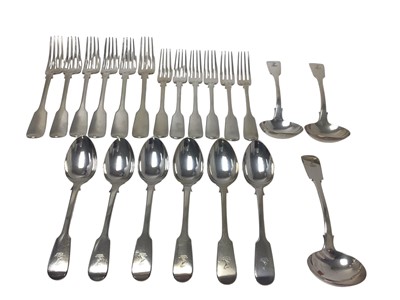 Lot 241 - Victorian part canteen of silver fiddle pattern flatware comprising x3 sauce ladles, x6 diner forks, x6 starter forks and x6 dessert spoons, each piece with an engraved armorial, (London 1838), m...