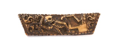 Lot 880 - Antique Tibetan carved bone tantric apron ornament depicting reclining skeleton