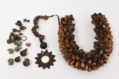 Lot 881 - Antique shell necklace and charms, bells and similar