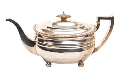 Lot 307 - George III silver teapot with gadrooned edge, ivory knop, on four ball feet, (London 1812), maker Thomas Hayter, all at 20.5ozs. APHA Ref