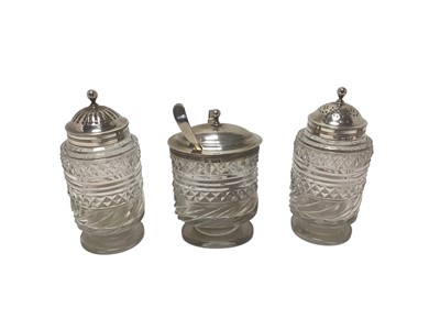 Lot 303 - Three George III silver mounted and cut glass condiment bottles