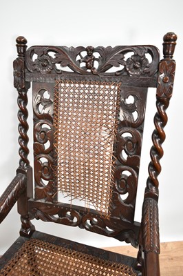 Lot 1231 - Near pair of 17th century Carolean style oak and walnut elbow chairs on barley twist supports