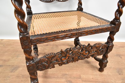 Lot 1231 - Near pair of 17th century Carolean style oak and walnut elbow chairs on barley twist supports