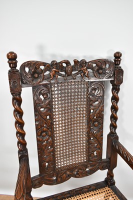 Lot 1231 - Near pair of 17th century Carolean style oak and walnut elbow chairs on barley twist supports