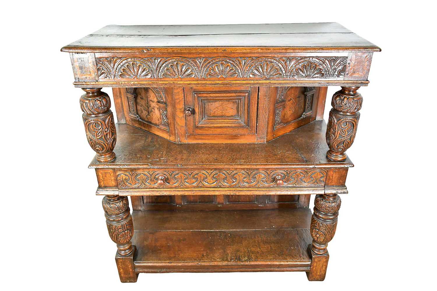 Lot 1232 - 17th style oak carved court cupboard with carved bulbous supports