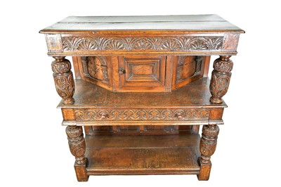 Lot 1232 - 17th style oak carved court cupboard with carved bulbous supports