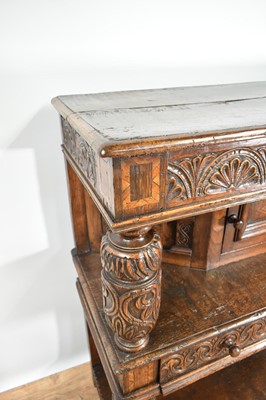 Lot 1232 - 17th style oak carved court cupboard with carved bulbous supports