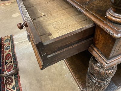 Lot 1232 - 17th style oak carved court cupboard with carved bulbous supports