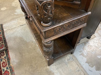 Lot 1232 - 17th style oak carved court cupboard with carved bulbous supports