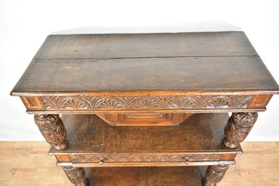 Lot 1232 - 17th style oak carved court cupboard with carved bulbous supports