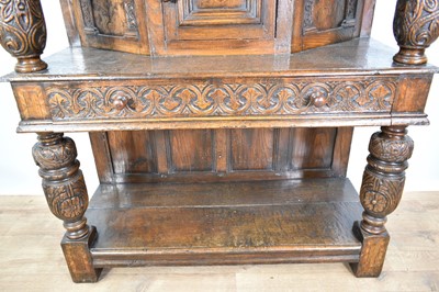 Lot 1232 - 17th style oak carved court cupboard with carved bulbous supports