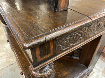 Lot 1232 - 17th style oak carved court cupboard with carved bulbous supports