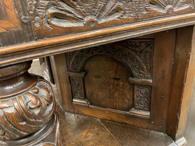 Lot 1232 - 17th style oak carved court cupboard with carved bulbous supports