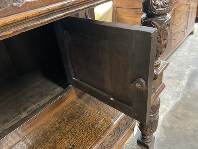 Lot 1232 - 17th style oak carved court cupboard with carved bulbous supports