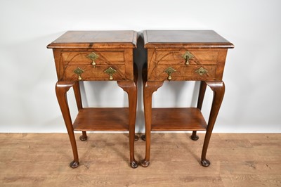 Lot 1233 - Pair of Queen Anne revival crossbanded walnut two tier bedside chests with drop brass handles