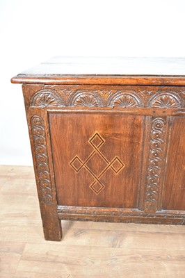 Lot 1235 - 17th century carved oak three panelled coffer
