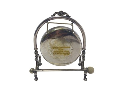 Lot 302 - Edwardian silver plated dinner gong, suspended from an ornate frame, raised on four claw and ball feet, with engraved presentation inscription 'St Albans Schools 1904 High Jump (open) F. A. M. W...