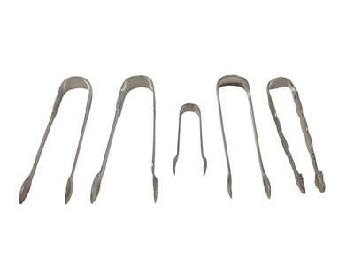 Lot 325 - Four pairs of Georgian silver sugar tongs, (various dates and makers), all at approximately 5ozs.