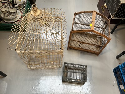 Lot 5042 - Three wire bird cages, including two with wooden frames (3)