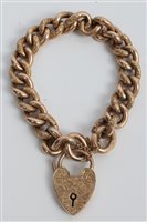 Lot 3382 - Gold (9ct) curb link chain bracelet with heart-...