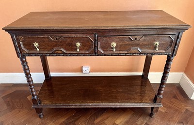 Lot 1339 - 1920s oak serving table in the Jacobean style, with two drawers, on turned legs with undertier, 122cm wide x 48cm deep x 93cm high