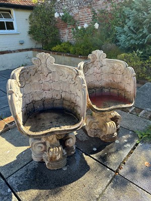 Lot 1359 - Pair of Victorian-style reconstituted Grotto garden chairs with foliate scroll cresting, on scroll supports, 86cm high overall