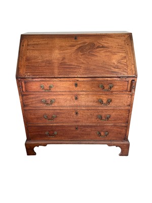 Lot 1362 - George III mahogany bureau, with sloping fall enclosing a fitted stepped interior about central cupboard, four graduated drawers below, each with original brass fittings, on bracket feet, 92cm w...