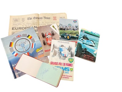 Lot 146 - Motorsport interest- group of 1960s motor racing programmes and an autograph album containing many drivers of the era. TBA for Automobilia Auction