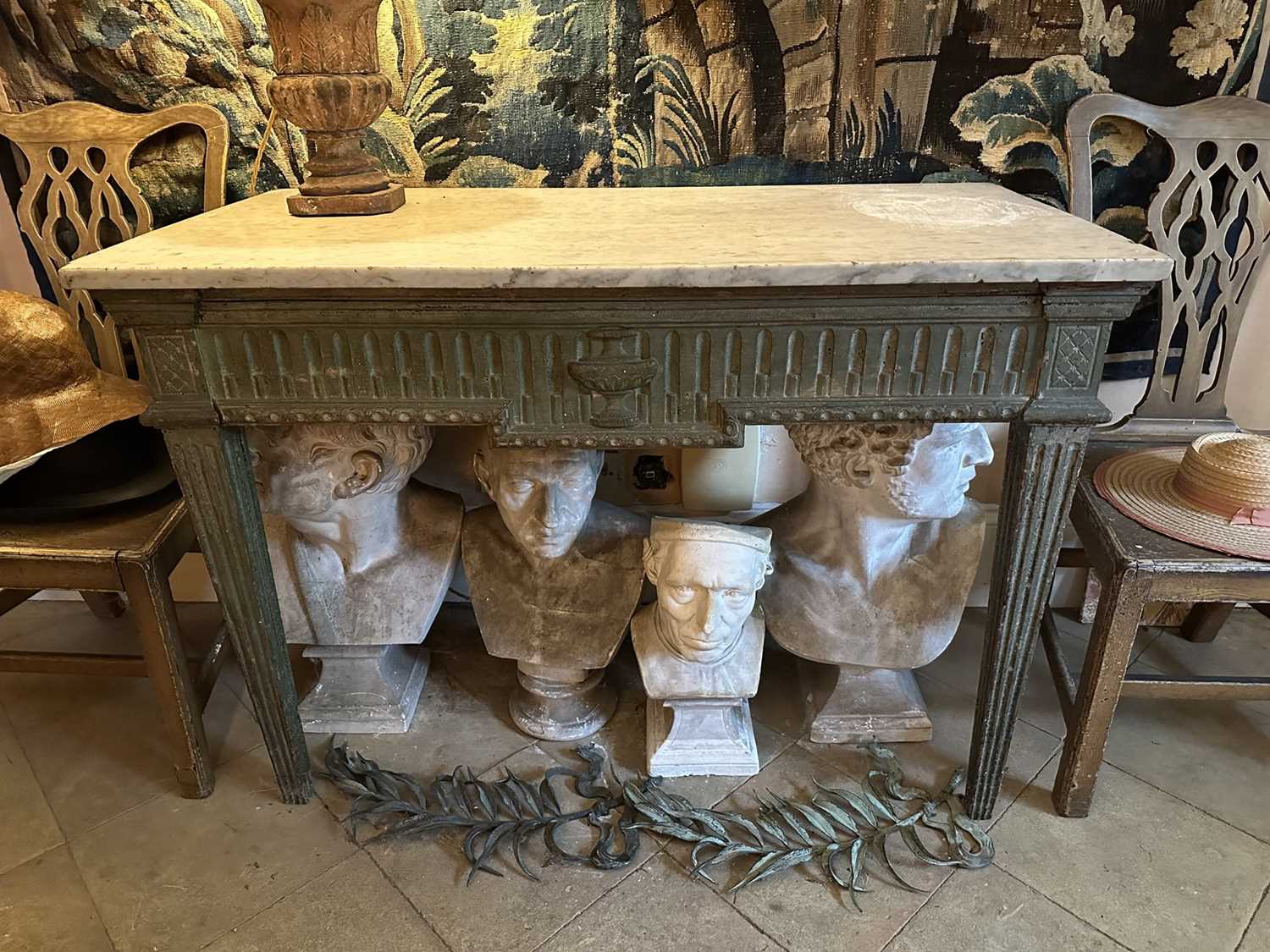 Lot 1500 - Good French Louis XVI green painted side table, the rectangular white marble top supported on a green painted base with carved frieze with central urn mount, on square tapered and fluted legs