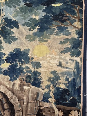 Lot 1502 - Flemish, late 17th / early 18th century Verdure tapestry depicting a sunrise over a bridge Provenance: Joanna Booth, Kings Road, London, 29th September 1990