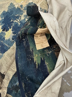 Lot 1502 - Flemish, late 17th / early 18th century Verdure tapestry depicting a sunrise over a bridge Provenance: Joanna Booth, Kings Road, London, 29th September 1990